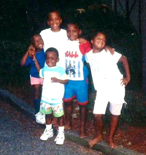 Dr. Fisher, far right, in a rare childhood gathering with her siblings from both families in 1991.